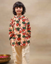 Laad`s Child wearing a floral print gul bagh kurta pyjama set full-sleeve embroidered kurta set, perfect festive wear for boys . Handcrafted in laadindia best kids wear shops in india.