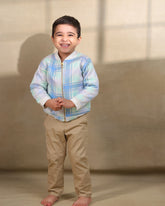 Boy kid wearing plaid check bomber jacket in soft cotton , perfect winter wear .