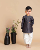 Young boy wearing LAAD India vintage grape kurta with embroidered detail, paired with cream pants a perfect boy`s ethnic wear kurta pyjama set