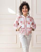 laad kid in White rabbit patchwork bomber jacket playfully features bunny details