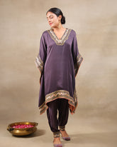 Plum purple embroidered kaftan with gold floral details, paired with dhoti pants – elegant festive wear outfit for weddings and diwali party