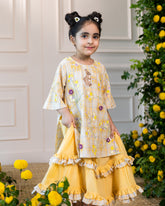Laad`s kid in Full-length one piece sunlit ghera dress lehenga style with hand-embroidered crocheted flowers, umbrella sleeves