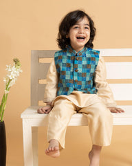 A Champion Blush Kurta Pyjama Set featuring a luxurious silk Chanderi waistcoat with an azure blue and mocha check pattern. The kurta boasts intricate embroidery, a classic bandhgala collar, detailed placket, and finely crafted sleeve accents, creating an elegant and coordinated look for festive occasions.