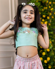 A vibrant Blooming Meadow Co-ord Set featuring a sleeveless silk Chanderi crop top with playful bunny embroidery and intricate threadwork, paired with a long coat featuring a meadow-inspired printed collar. Complete with breezy culottes pants that offer a stylish yet comfortable kidswear fit.