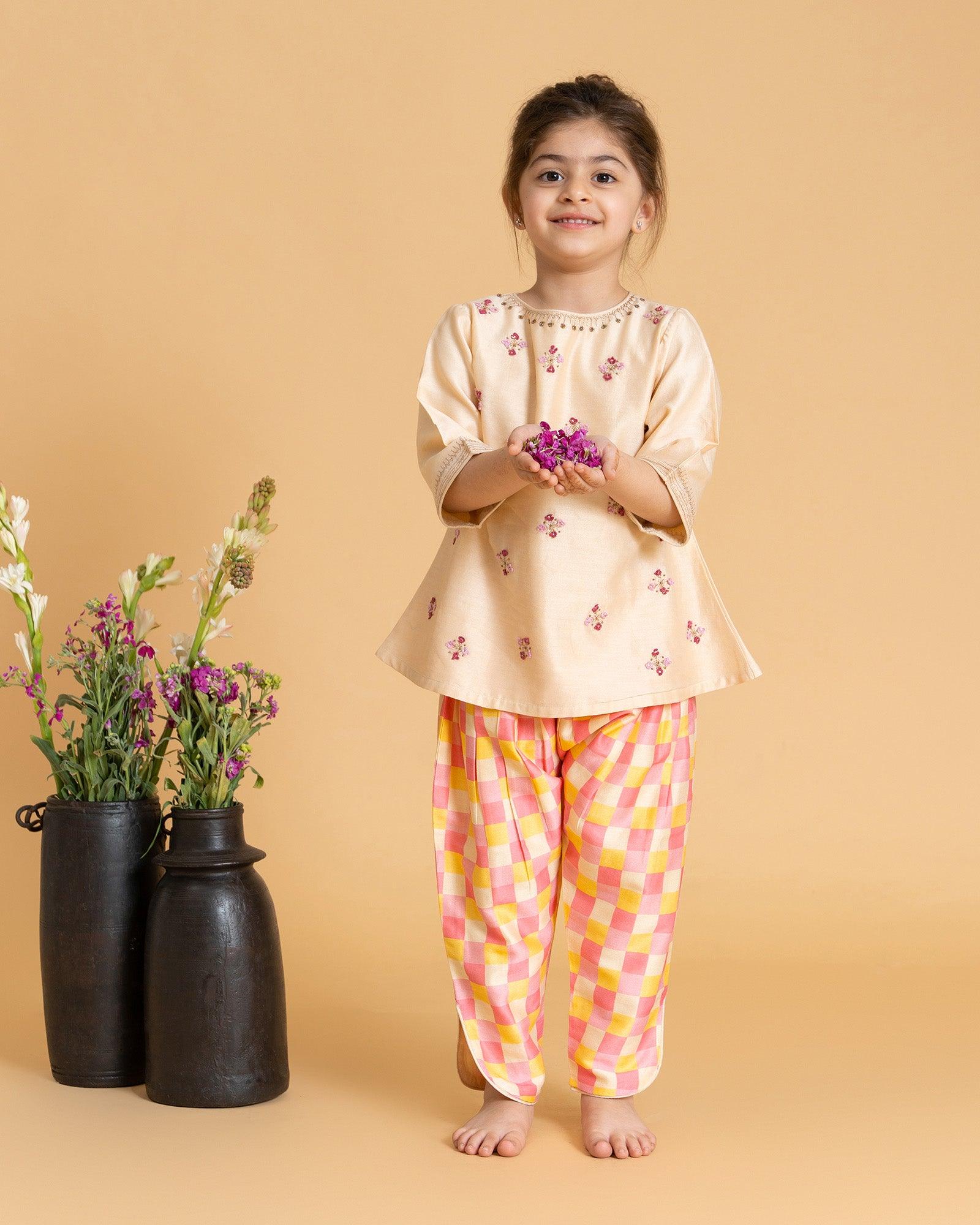 LAAD Kids' Cream Embroidered Kurta Set – a delicate floral kurta with pastel checkered Patiala and a sheer pink dupatta for a festive charm