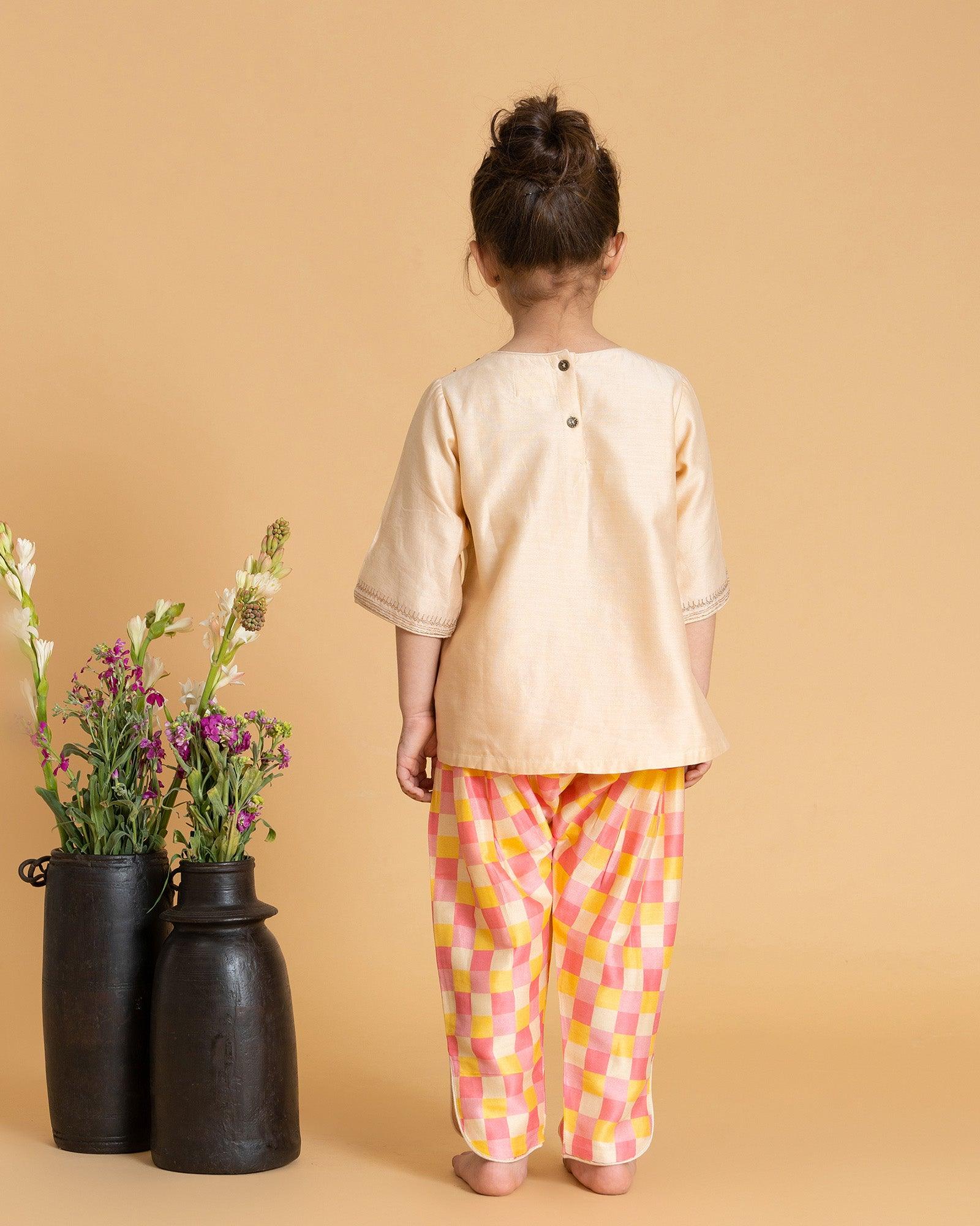 LAAD Kids' Cream Embroidered Kurta Set – a delicate floral kurta with pastel checkered Patiala and a sheer pink dupatta for a festive charm