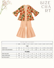 Girl wearing a handcrafted floral red kimono style top with embroidered neckline and flared ivory sharara pants – ethnic festive kidswear by LAAD