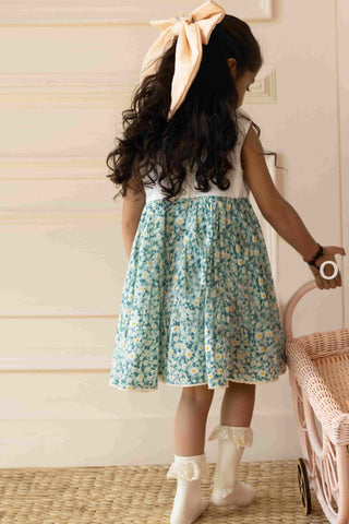 lora dress has embroidered bunnies hop on the hand-stitched neckline. Cotton lace yoke adds charm. Breezy & comfy for warm days. Easy click-button back. SummerStyle