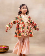 Girl wearing GLUBAGH PEACH SHARARA a handcrafted floral red kimono style top with embroidered neckline and flared ivory sharara pants – its perfect traditional kurta pyjama , kids ethnic wear by LAAD