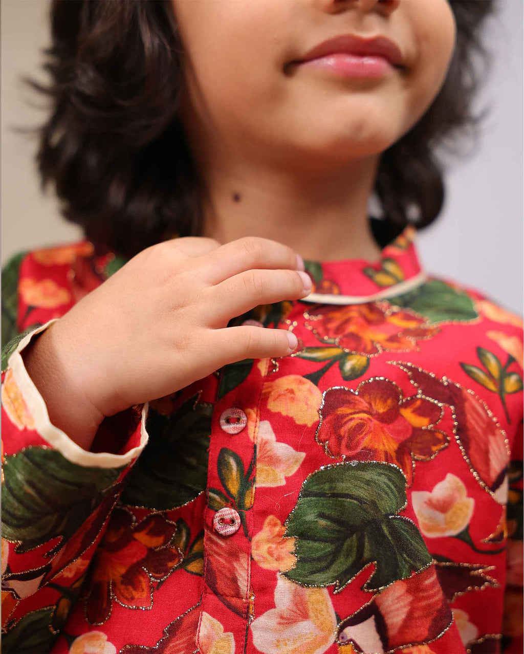 Laad`s Child wearing a floral print gul bagh kurta pyjama set full-sleeve embroidered kurta set, perfect festive wear for boys . Handcrafted in laadindia best kids wear shops in india.