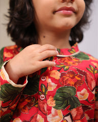 Young boy wearing a gulbagh kurta pyjama set with buttoned neckline and ivory straight pants – festive traditional kidswear by LAAD
