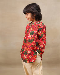 Young boy wearing a gulbagh kurta pyjama set with buttoned neckline and ivory straight pants – festive traditional kidswear by LAAD