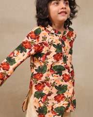 Laad`s Child wearing a floral full-sleeve kurta pyjama set, beige pyjama  with pocket kurta with badla work all over