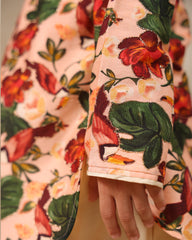Laad`s Child wearing a floral full-sleeve kurta pyjama set, beige pyjama  with pocket kurta with badla work all over