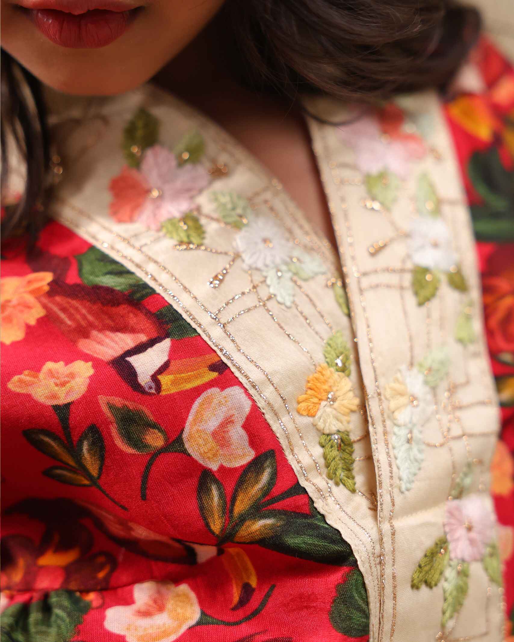 Girl wearing a handcrafted floral red kimono style party wear sharara with embroidered neckline and paired with  flared ivory sharara pants – perfect girls festive kidswear, occasion and celebration wear by LAADindia.