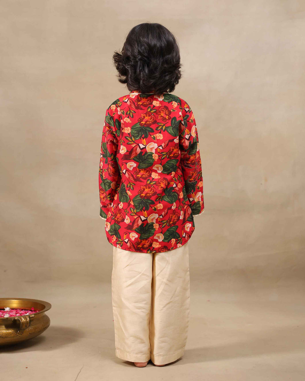 Laad`s Child wearing a floral print gul bagh kurta pyjama set full-sleeve embroidered kurta set, perfect festive wear for boys . Handcrafted in laadindia best kids wear shops in india.