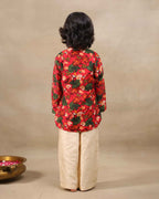 Laad`s Child wearing a floral print gul bagh kurta pyjama set full-sleeve embroidered kurta set, perfect festive wear for boys . Handcrafted in laadindia best kids wear shops in india.