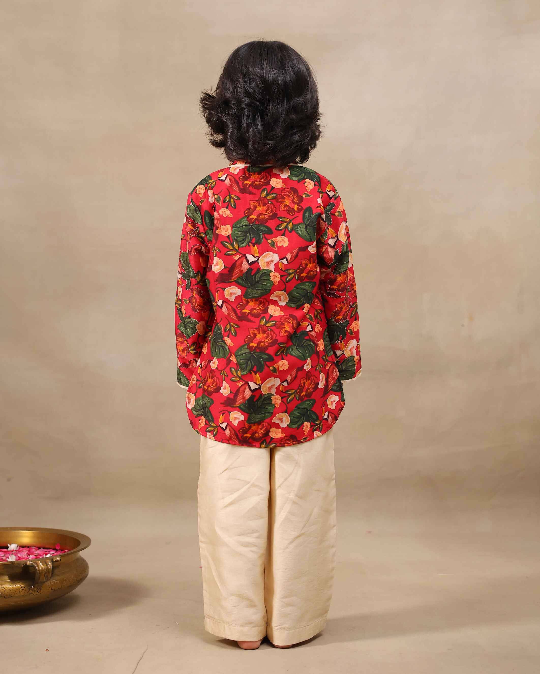 Laad`s Child wearing a floral print gul bagh kurta pyjama set full-sleeve embroidered kurta set, perfect festive wear for boys . Handcrafted in laadindia best kids wear shops in india.