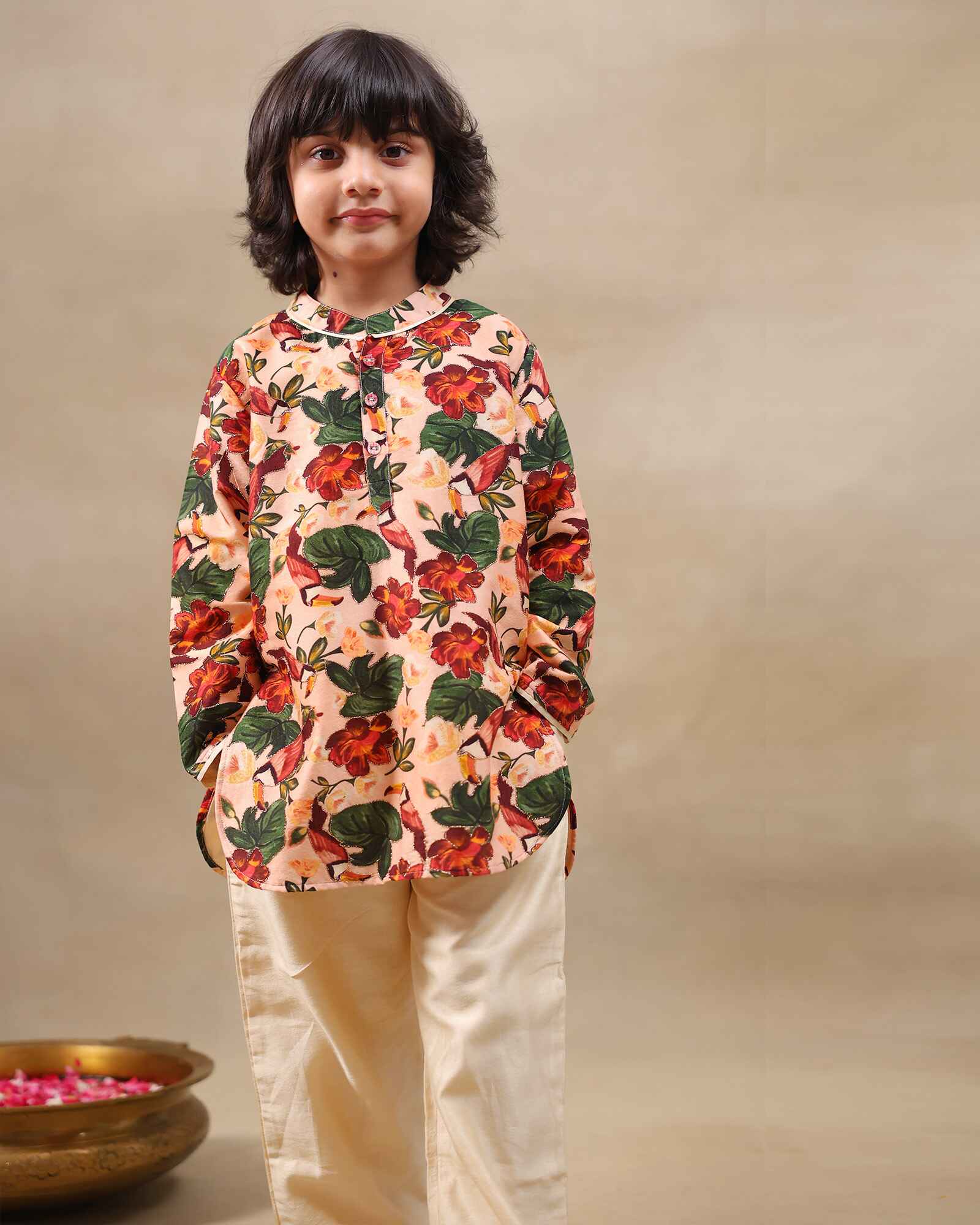 Laad`s Child wearing a floral print gul bagh kurta pyjama set full-sleeve embroidered kurta set, perfect festive wear for boys . Handcrafted in laadindia best kids wear shops in india.
