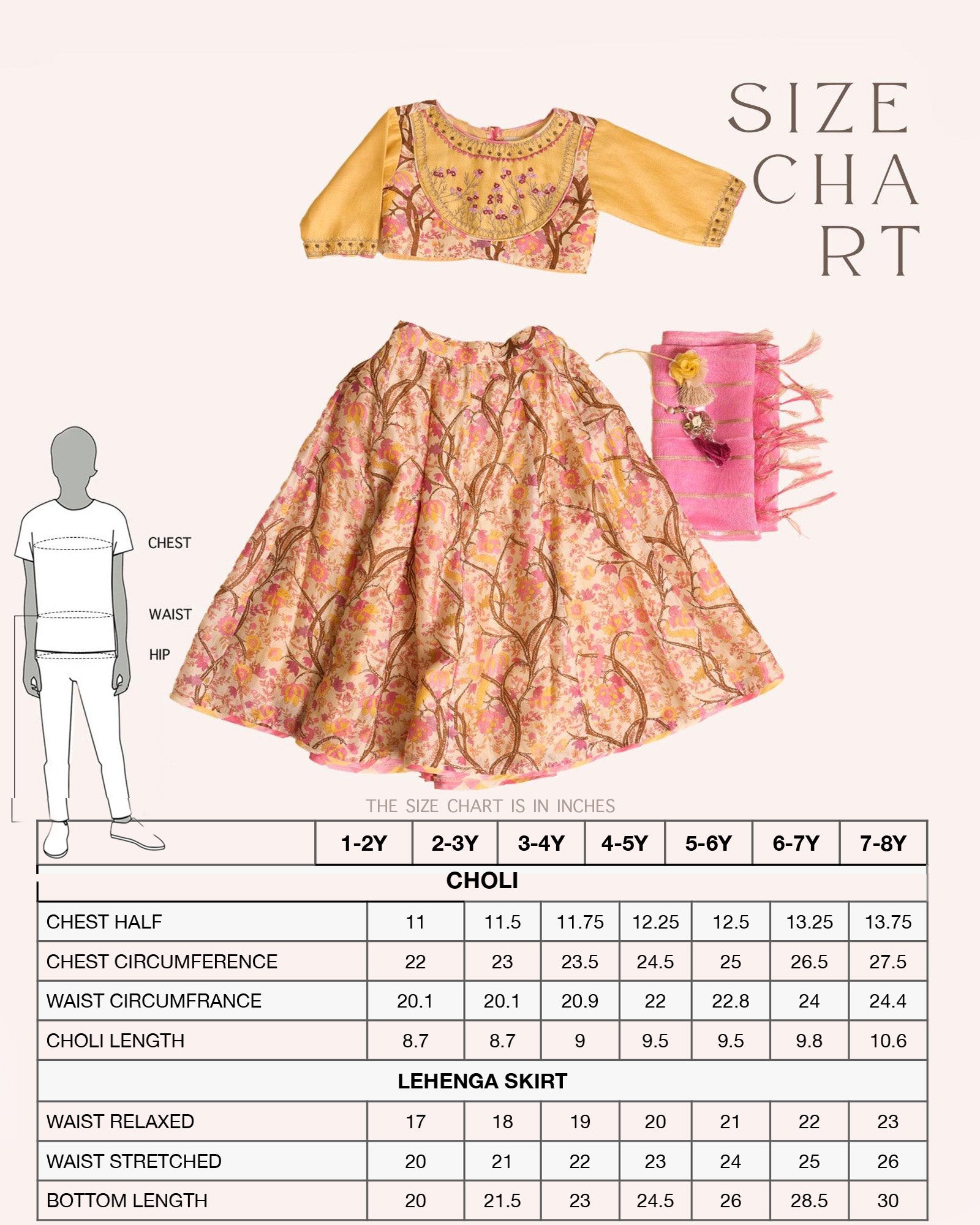 A girl in a floral embroidered blouse and skirt with badla work, tassel tie-up, and a pink lurex dupatta, exuding festive charm.v