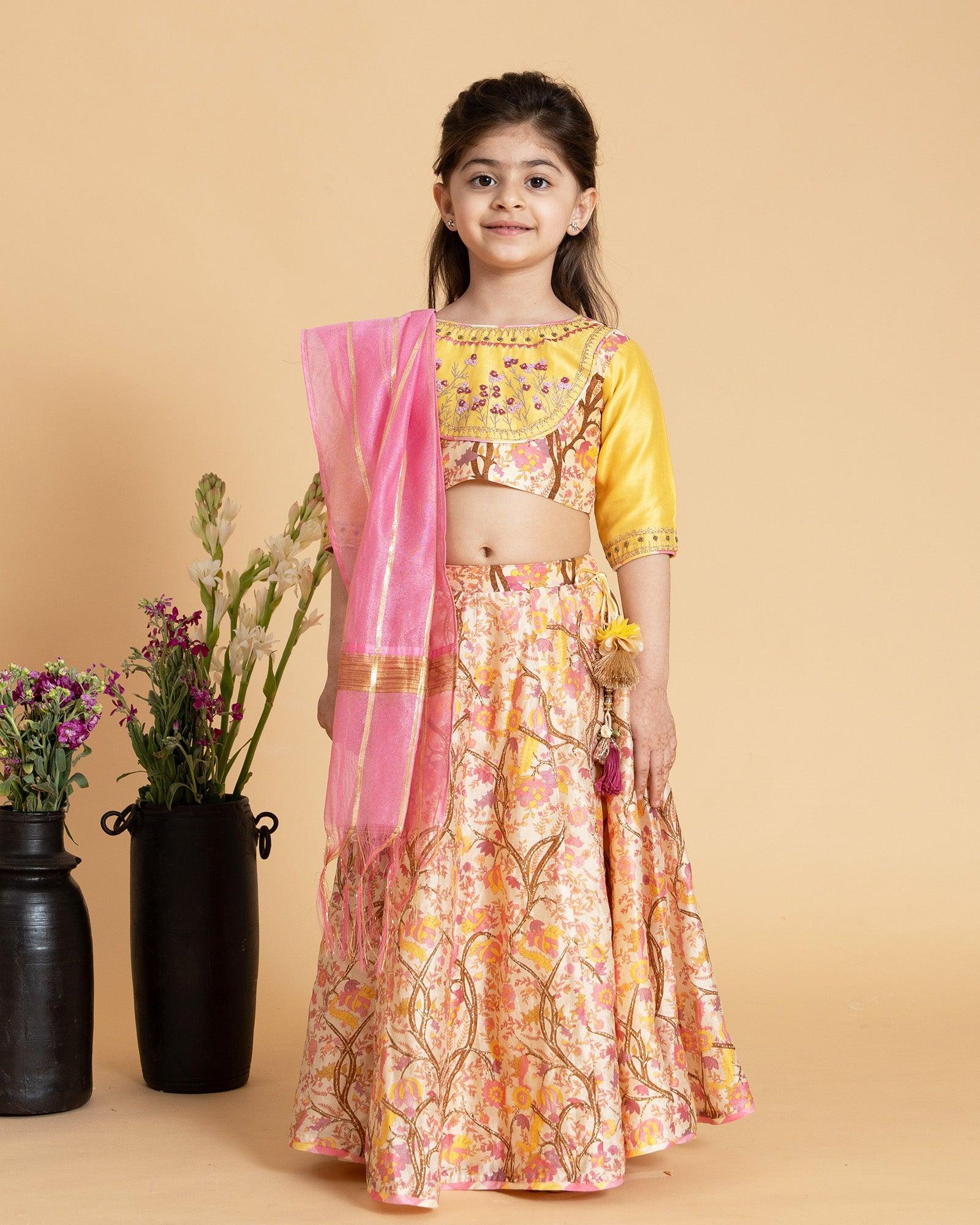 Hand-crafted Maize lehenga set for your little princess, perfect for a wedding. Includes lehenga skirt, blouse, and dupatta. Luxurious silk chanderi fabric with soft cotton mulmul lining for comfort. Intricate badla hand-work on skirt and exquisite hand-embroidery on blouse.