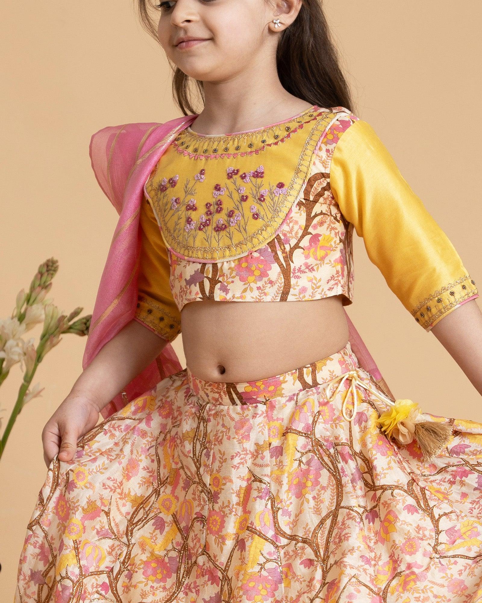 Hand-crafted Maize lehenga set for your little princess, perfect for a wedding. Includes lehenga skirt, blouse, and dupatta. Luxurious silk chanderi fabric with soft cotton mulmul lining for comfort. Intricate badla hand-work on skirt and exquisite hand-embroidery on blouse.