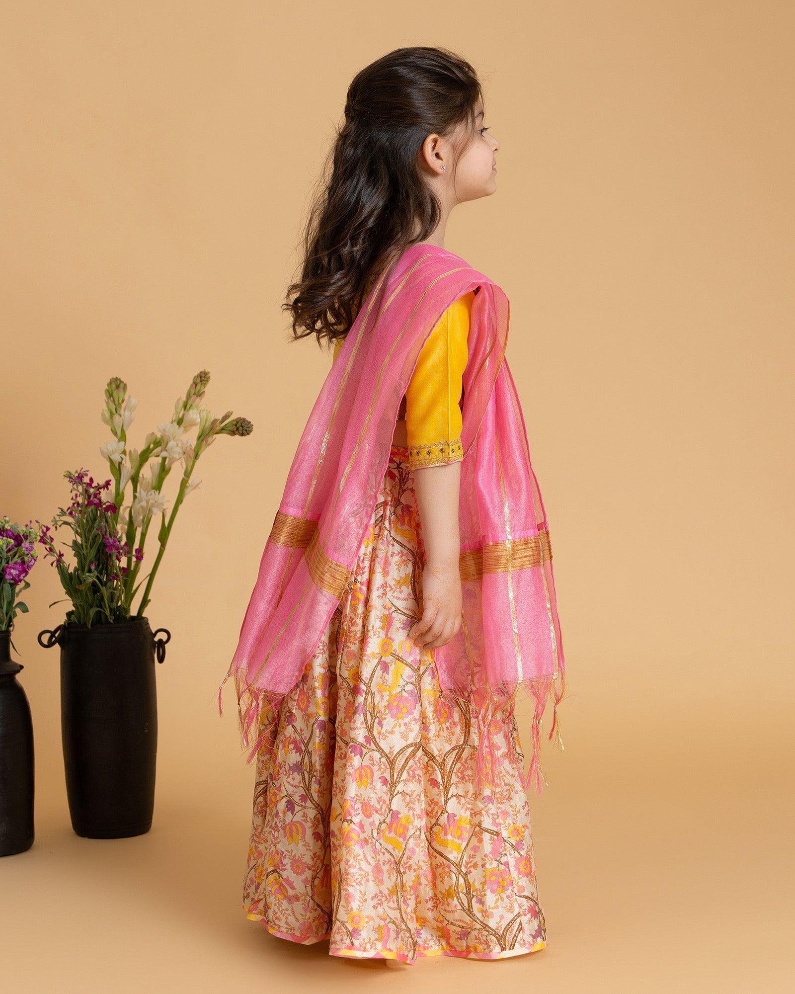 Hand-crafted Maize lehenga set for your little princess, perfect for a wedding. Includes lehenga skirt, blouse, and dupatta. Luxurious silk chanderi fabric with soft cotton mulmul lining for comfort. Intricate badla hand-work on skirt and exquisite hand-embroidery on blouse.