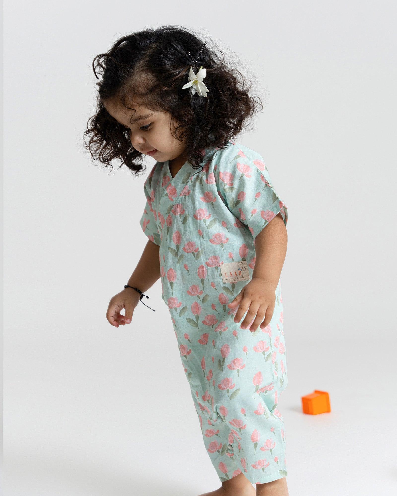 Sustainable adorable mint green tulip kimono romper is a delightful one-piece outfit, designed to capture the essence of a meadow in full bloom. This mint green kimono-style design, adjustable straps, and 100% cotton fabric. Made in India made in India with care by Laad in Every Touch.