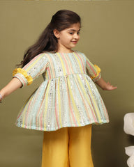 Minty green mirror peplum with bell pants: Chic, comfortable, festive. Intricate mirror work, soft cotton, snap button closure, 3/4 sleeves, trendy checkered dhoti. Perfect for kids! by laadindia.com