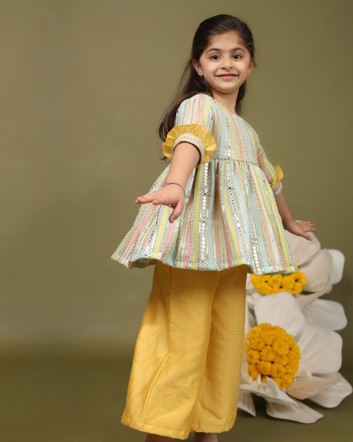 Minty green mirror peplum with bell pants: Chic, comfortable, festive. Intricate mirror work, soft cotton, snap button closure, 3/4 sleeves, trendy checkered dhoti. Perfect for kids! by laadindia.com