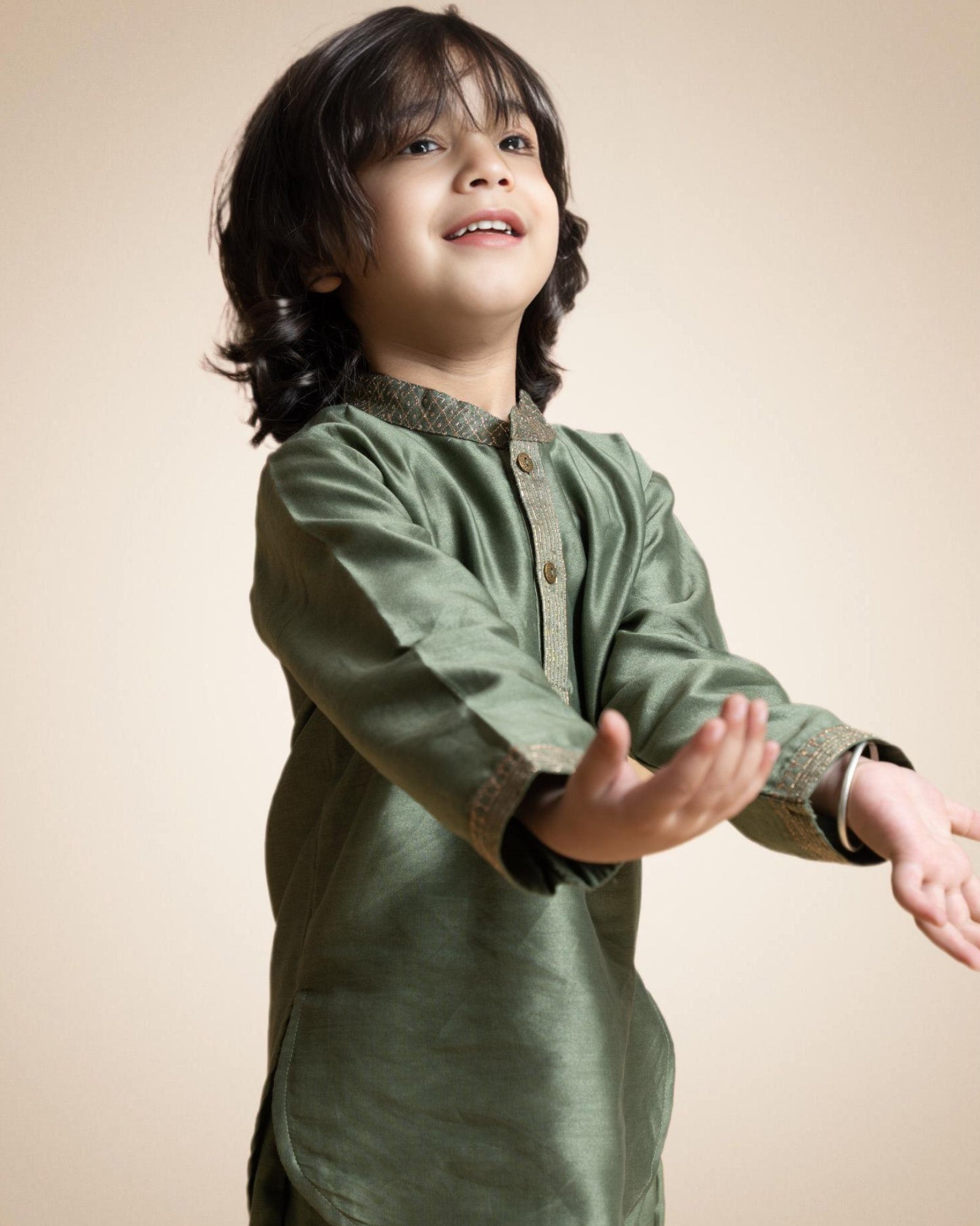 Royal Moss Green Bandhgala Kurta Pyjama - Festive elegance. 2-piece set. Bandhgala collar, full sleeves. Knee-length kurta with badla work. Soft cotton lining perfect for baby skin by laadindia.com