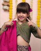 Moss green lehenga, blouse, dupatta. Silk chanderi, cotton mulmul lining. Hand-embroidered, badla work, ari-handwork. Paisley prints, beads and trims perfect wedding attire. by laadindia.com