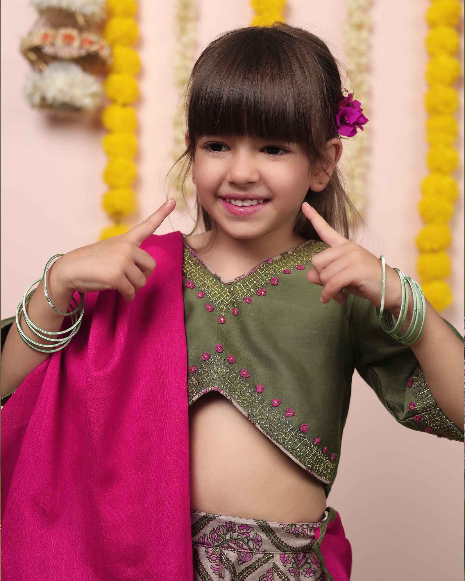 Moss green lehenga, blouse, dupatta. Silk chanderi, cotton mulmul lining. Hand-embroidered, badla work, ari-handwork. Paisley prints, beads and trims perfect wedding attire. by laadindia.com