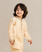 Little boy in a stylish Phulwari almond blush kurta set with delicate embroidery, showcasing festive elegance and comfort. Perfect ethnic wear for kids by laad.