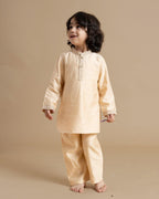 Little boy in a stylish Phulwari almond blush kurta set with delicate embroidery, showcasing festive elegance and comfort. Perfect ethnic wear for kids by laad.