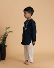 Phulwari Marine Blue kurta pyjama: Royal Bandhgala, hand-embroidered anchors & beads on placket. by laadindia