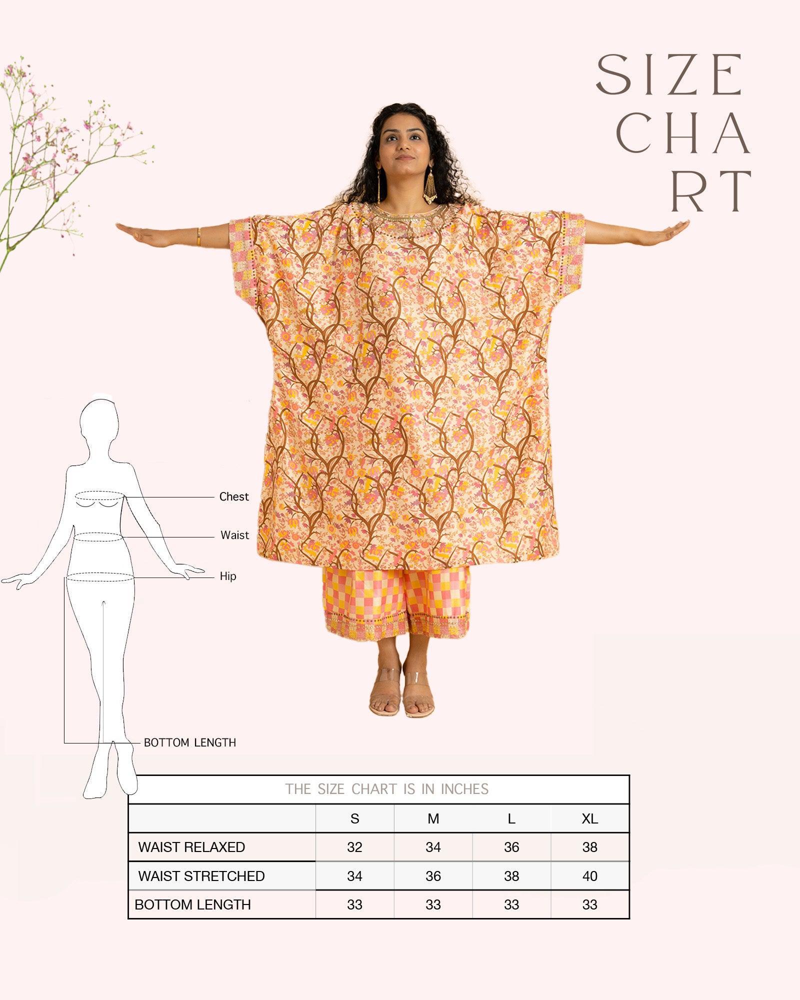 Capture spring's essence! Our Phulwari shades of spring kaftan (free size, boat neck) boast a blossom print & delicate embroidery. Flowing checkered palazzos graze the ankle.
