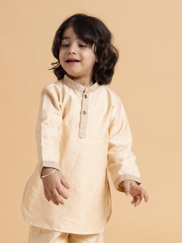 LAAD Kids' Beige Kurta Set with Printed Nehru Jacket – a timeless ethnic ensemble featuring intricate embroidery and a floral jacket for a regal touch
