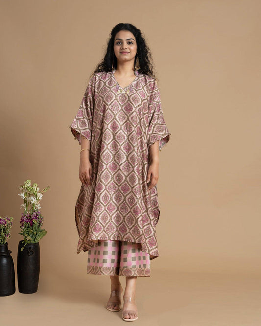 Phulwari's kaftan: V-neck & ambi-inspired print. Delicate embroidery, sleeve details. Flowing checkered palazzos. Comfy & stylish perfect festive wear