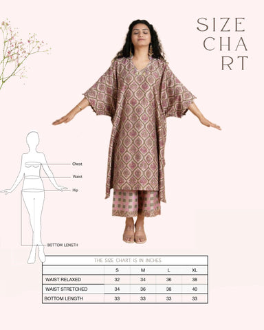 Phulwari's kaftan: V-neck & ambi-inspired print. Delicate embroidery, sleeve details. Flowing checkered palazzos. Comfy & stylish perfect festive wear