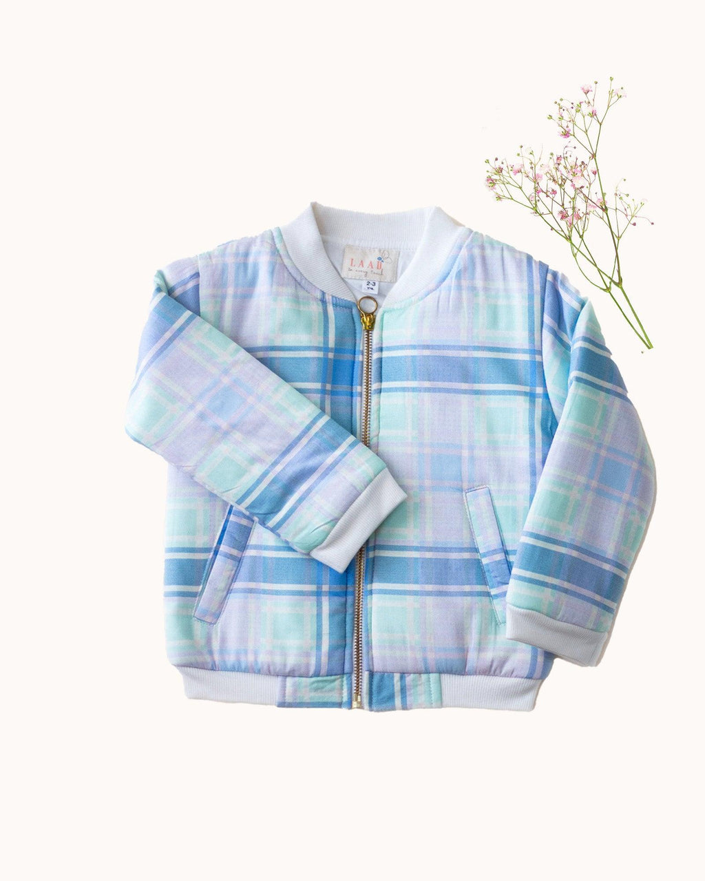 Boy kid wearing plaid check bomber jacket in soft cotton , perfect winter wear .