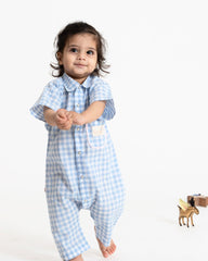 Sweet summer style! Our powder blue checkered romper is crafted from super-soft cotton & features a crisp collar for a touch of preppy charm. Perfect for keeping your little one cool & comfy all season long.