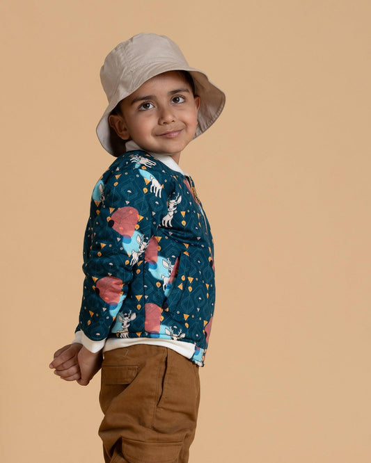  Keep your child warm & stylish this winter. Soft cotton, extra insulation for chilly adventures. Golden zippers add a touch of class. A true statement piece! REINDEER BOMBER HACKET