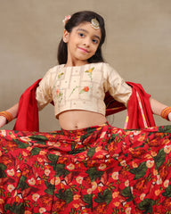 Young girl wearing LAAD’s floral red rose lehenga set with embroidered blouse and dupatta – festive ethnic wear for kids, perfect for weddings and celebrations.