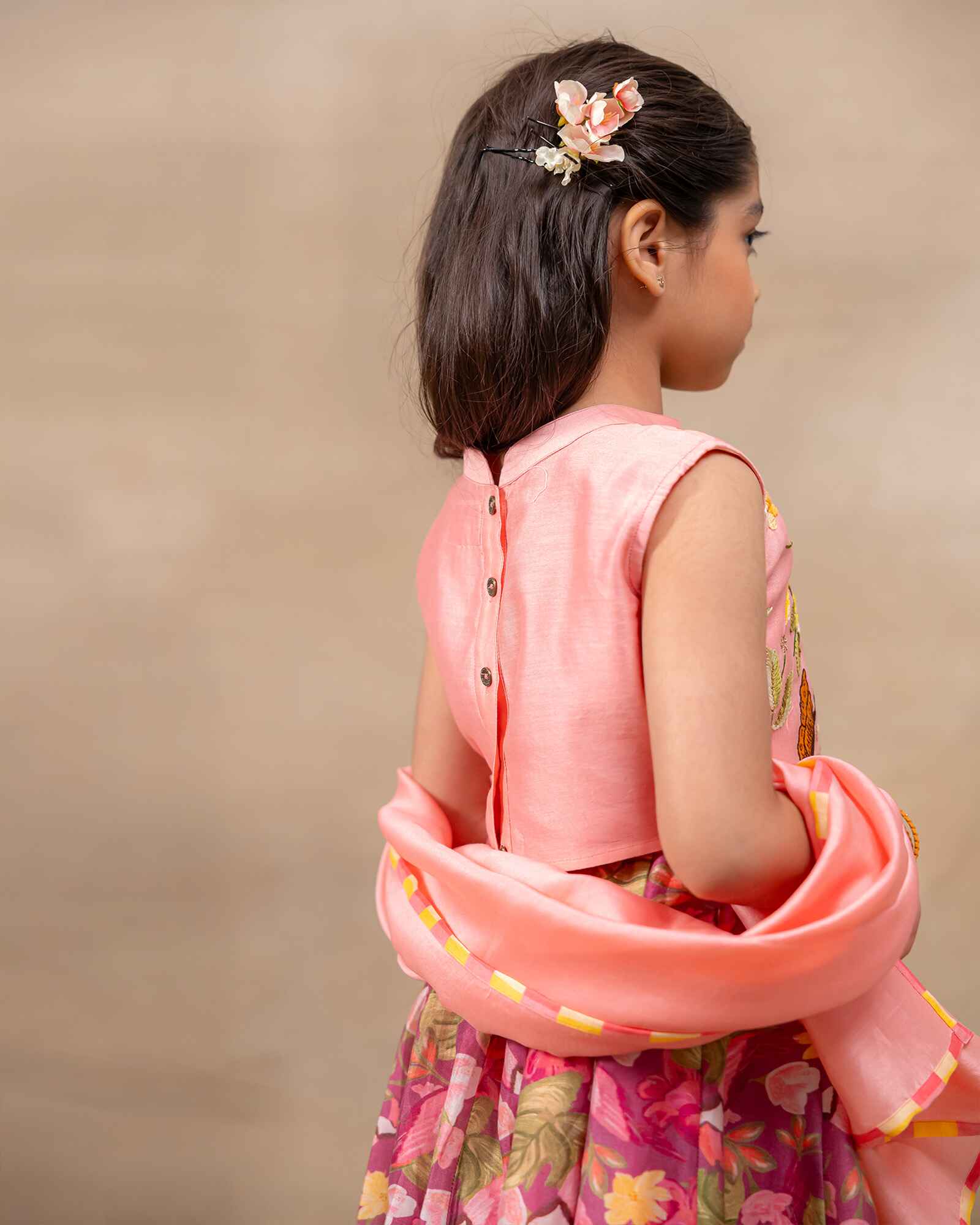 girl in rosy ruffle lehenga with dupatta , cunnari lehenga for laadli clothing made by laadindia  perfect ethnic wear and indian traditional wear for girls 