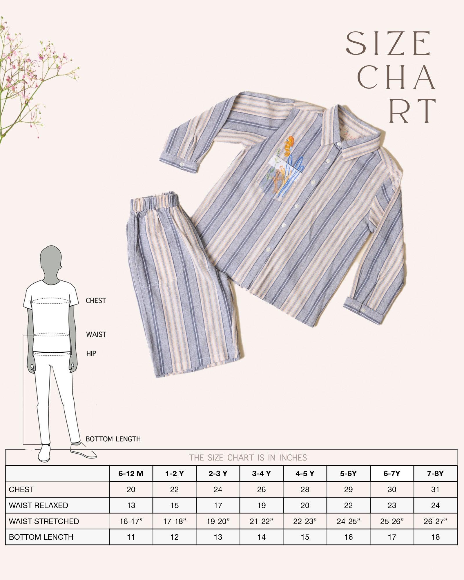 laad`s Kids' striped co-ord set with a long-sleeve shirt and shorts, featuring soft beige and gray tones. Embroidered seahorse detail adds a playful touch. Lightweight, breathable fabric for all-day comfort.