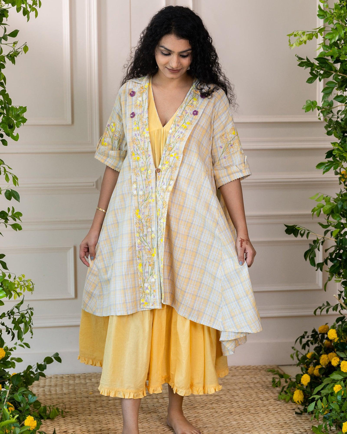 Twirl in celebration! Eye-catching, free-flowing A-line sunshine ghera dress (one size) perfect for mehndi & haldi festivals. Two-layer, flattering design with beautiful hand embroidery and a v-neckline.  