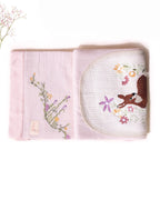 Hand-stitched Bambi dohar: nestled in flowers. 100% cotton muslin for ultimate softness & sleep.touchoffushiabambi dohar
