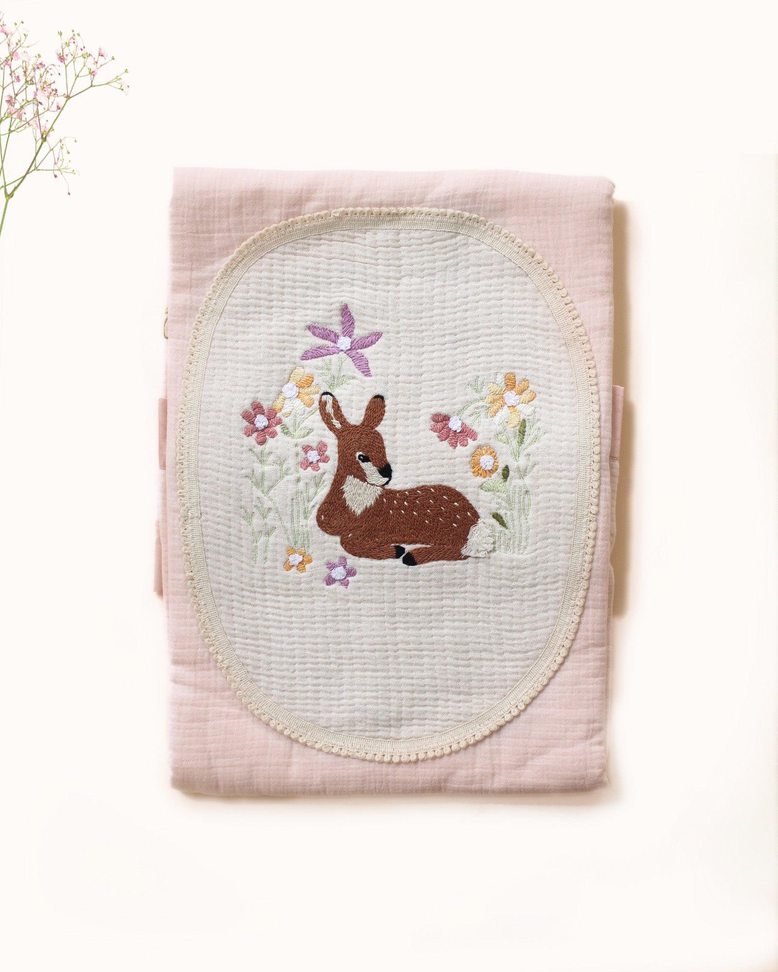 Hand-stitched Bambi dohar: nestled in flowers. 100% cotton muslin for ultimate softness & sleep.touchoffushiabambi dohar