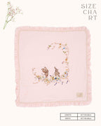 Soft touch of fushia bunny dohar for baby with delicate embroidery featuring two bunnies surrounded by a floral wreath. Made from lightweight, breathable fabric with a satin border—perfect for cozy naps and gentle on baby’s skin.